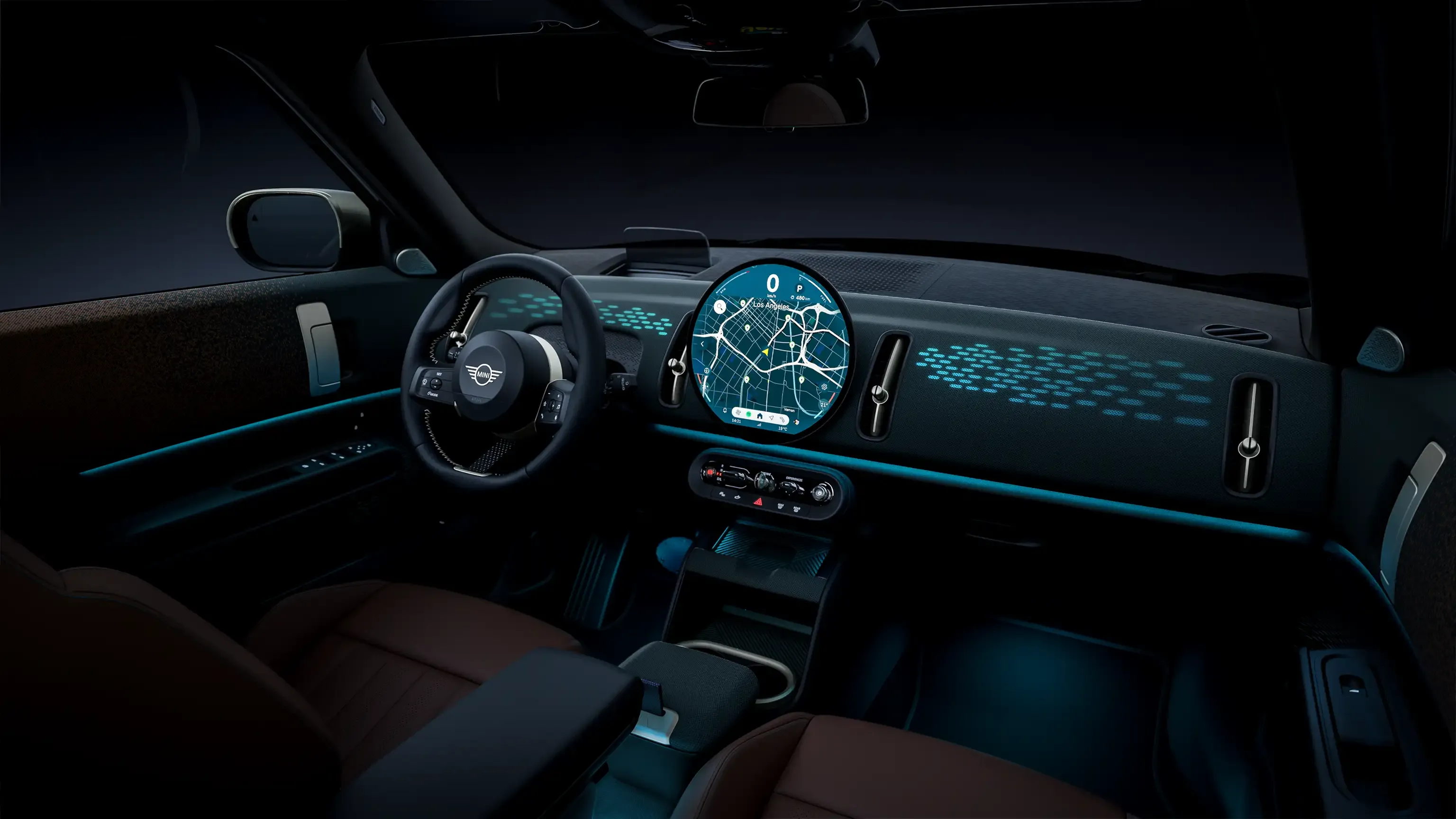 Interior view of a modern car's dashboard at night, featuring a large digital display and ambient lighting.